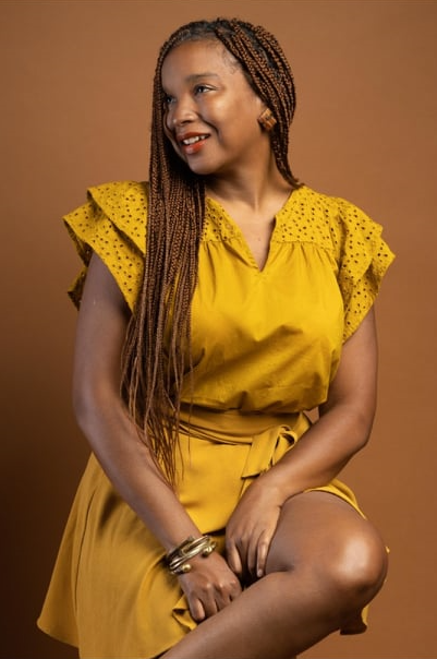 Smiling picture of author Qiana M Davis